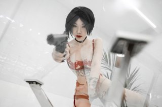 Косплей сексуальная азиатка в образе Ады Вонг с красивой фигурой